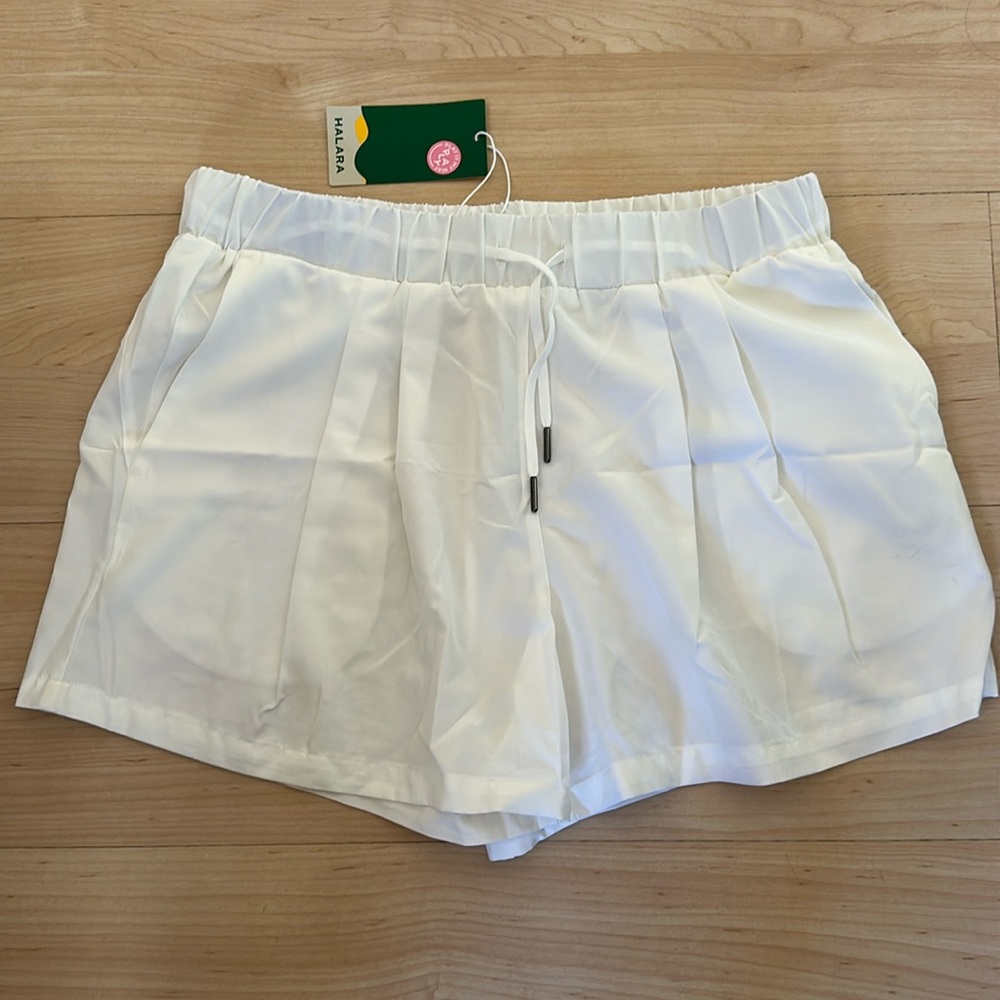 New with tags, Halara athletic shorts, white, pockets, size L,